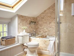 a bathroom with a toilet and a sink at 3 Bed in Niton oc-73299 in Niton +18 photos
