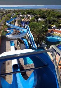 a water slide at a water park at La plage in Canet-en-Roussillon +1 photo
