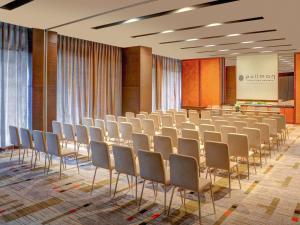 a room with rows of chairs and a screen at Pullman Vung Tau in Vung Tau +242 photos