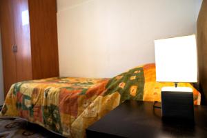 เตียงในห้องที่ Casa Vacanze La Rocca