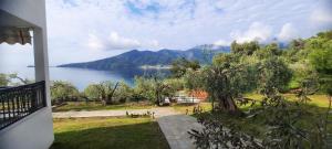 a view of a lake from a house at Namastekala Holidays Studios in Chrysi Ammoudia +39 photos
