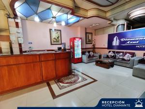 a waiting room at a hotel with a reception desk at Hotel Diamante Azul in La Paz