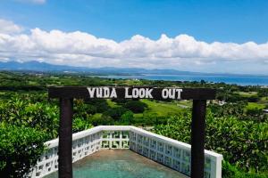 a sign that says villa look out on a building at Vunakavika House - Village Stay in Nadi +1 photo