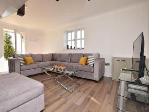 a living room with a couch and a table at 2 Bed in Lamesley oc-cn107 in Lamesley
