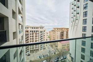 a view of a city from a window in a building at Baku Sabah Apart in Baku