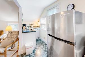 a kitchen with a stainless steel refrigerator at Everyday is Saturday in Vineyard Haven