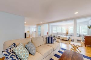 a living room with a couch and a table at Lake Elizabeth Terrace in Centerville