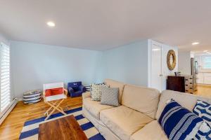 a living room with a couch and a table at Lake Elizabeth Terrace in Centerville