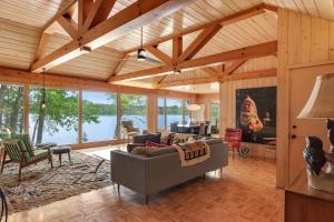 a living room with a couch and a table at Northwoods Oasis in Land O' Lakes