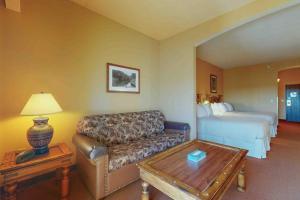 a hotel room with a couch and a bed at Chula Vista Resort 2224 in Wisconsin Dells