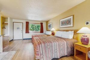 a hotel room with two beds and a window at Chula Vista Resort Villa # 7212 in Wisconsin Dells
