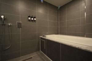 Koupelna v ubytování SOYU Hotel