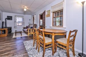 a dining room with a table and chairs at West Bay Pines in Saint Germain