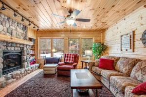 a living room with a couch and a fireplace at Casa Maria in Mercer