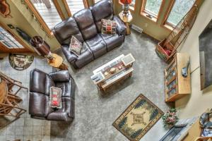 an overhead view of a living room with leather furniture at Copperwood #1 in Eagle River