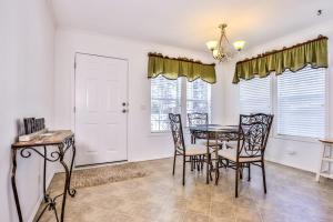a dining room with a table and chairs at Base Camp Eagle River in Eagle River