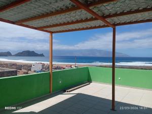 a balcony with a view of the beach at Casa Chez Zoe in Salamansa