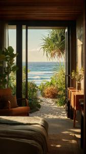 a room with a view of the ocean through a window at Komodo Island in Ruda