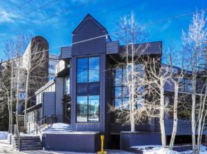 a black building with a window at Crestview Place Mountain View Balcony & Shuttle in Winter Park