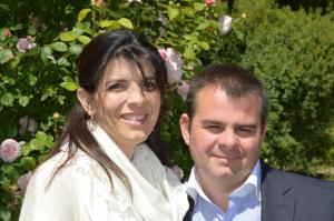 a man and a woman posing for a picture at Au Coeur d'Amiens in Amiens