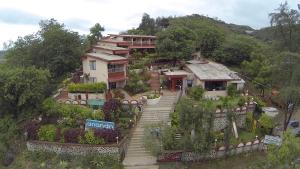an aerial view of a house on a hill at Hotel Anando , Saputara in Saputara