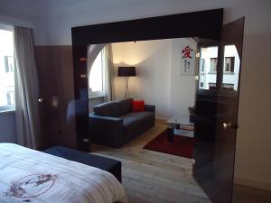 Llit o llits en una habitació de B&B Luxe Suites 1-2-3