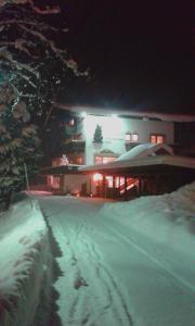 Gästehaus Bergland v zime