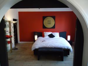 Llit o llits en una habitació de B&B Luxe Suites 1-2-3
