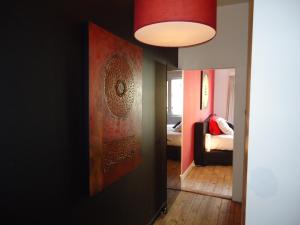 Llit o llits en una habitació de B&B Luxe Suites 1-2-3