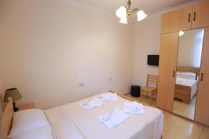 Postel nebo postele na pokoji v ubytování Guest House Goari