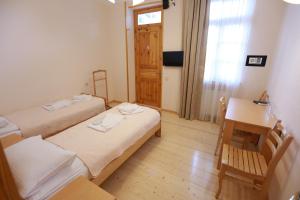 Postel nebo postele na pokoji v ubytování Guest House Goari