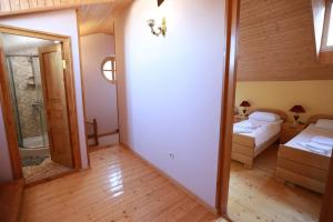 Postel nebo postele na pokoji v ubytování Guest House Goari