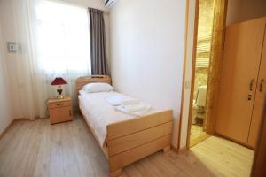 Postel nebo postele na pokoji v ubytování Guest House Goari