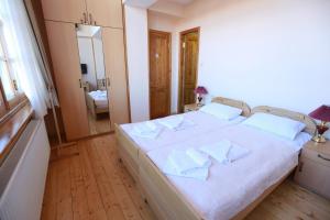 Postel nebo postele na pokoji v ubytování Guest House Goari