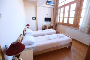 Postel nebo postele na pokoji v ubytování Guest House Goari