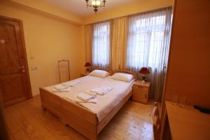 Postel nebo postele na pokoji v ubytování Guest House Goari