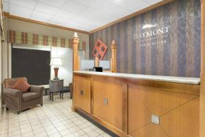 a bar in a waiting room with a chair at Baymont by Wyndham Sevierville Pigeon Forge in Sevierville