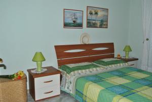 En eller flere senger på et rom på Casa Salina