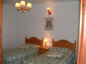 Ένα ή περισσότερα κρεβάτια σε δωμάτιο στο Casa las Las Viñas