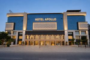 a hotel apollo building with a sign on it at Hotel Apollo Sp Ring Road Odhav Ahemdabad in Ahmedabad