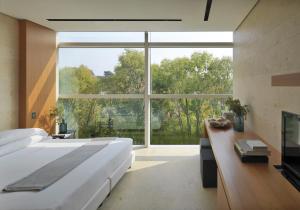 Postel nebo postele na pokoji v ubytování C-Hotel & Spa + 37 fotografií