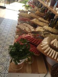 a buffet of food on display in a store at Liona Hotel & SPA in Gundogan