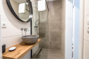 a bathroom with a sink and a shower at stuub langenbach in Titisee-Neustadt
