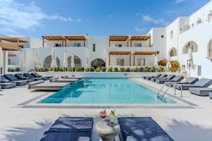 an image of a villa with a swimming pool at Aegean Plaza Hotel in Kamari