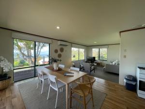 a kitchen and living room with a table and chairs at Denmark Scenic Tourist Park in Denmark
