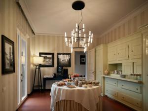 a kitchen with a table with food on it at Santa Maria Foris in Ravenna