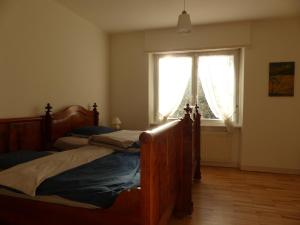 Postel nebo postele na pokoji v ubytování Gîte du moulin
