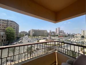 a view of a city from a balcony at Grand lotus hotel downtown in Cairo