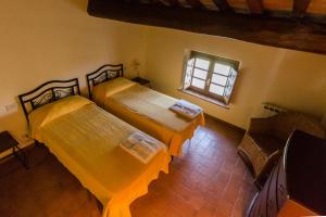 Letto o letti in una camera di Frantoio di Corsanico