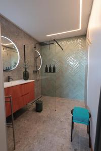 a bathroom with a shower and a sink at La Rosière en Gaume in Musson +11 photos